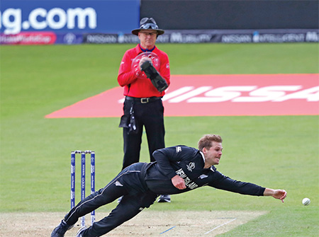 Lockie Ferguson of New Zealand fields the ball off his own bowling during the Bangladesh vs. New Zealand match