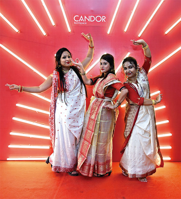 Guests wearing traditional Bengali saris - Candor TechSpace